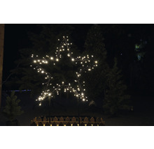 Vianočné osvetlenie v tvare hviezdy s teplým bielym svetlom v záhrade