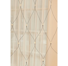 Svetelná reťaz v sieťovom dizajne pred oknom