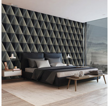 Moderná spálňa s trojrozmernou tapetou, posteľou a nočnými stolíkmi.