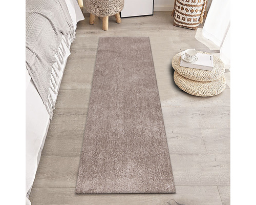 Obdĺžnikový koberec v spálni