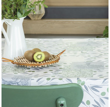 Dekorácia stola s olivovým vzorom, košík s kiwi a džbán s rastlinami