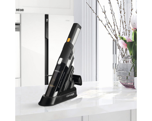 Akumulátorový vysávač s nabíjacou stanicou na povrchu