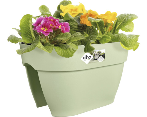 Plastový kvetináč s farebnými jarnými kvetmi