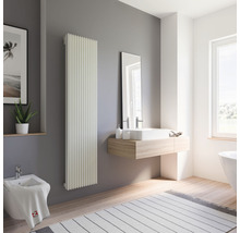 Moderná kúpeľňa s radiátorom, umývadlom a bidetom