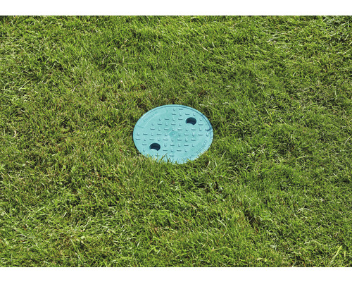 Okrúhle revízne šachtové veko v trávniku