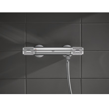 Termostatická batéria Grohe pre sprchu na sivej stene