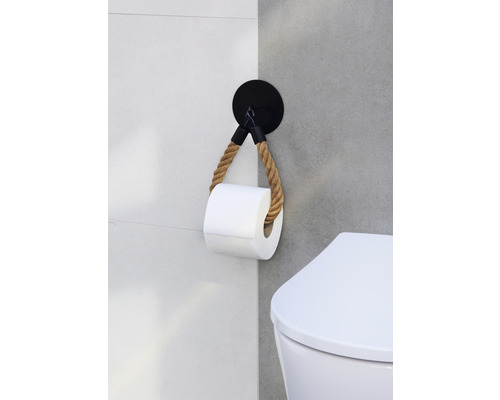 Držiak toaletného papiera z lana v kúpeľni vedľa toalety