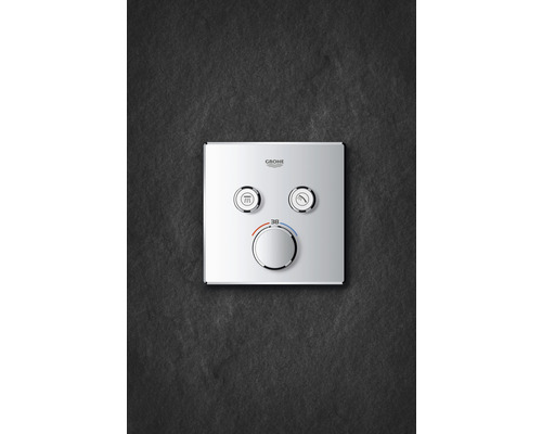 Logo Grohe. Sprchový termostat s funkciou plnenia vane a regulátorom teploty.