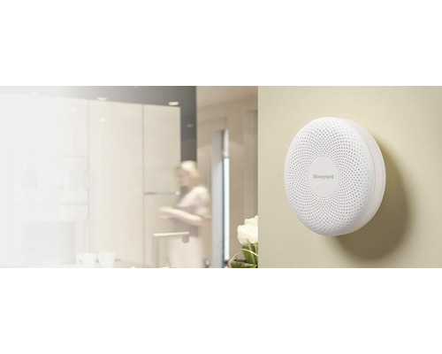 Logo Honeywell hlásič dymu na stene v miestnosti