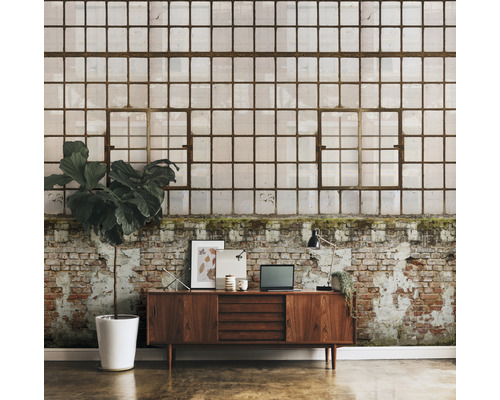 Fototapeta s motívom priemyselného okna nad komodou v izbe