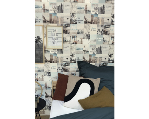 Spálňa s fototapetou s motívmi Kalifornie, vankúše a dekorácia
