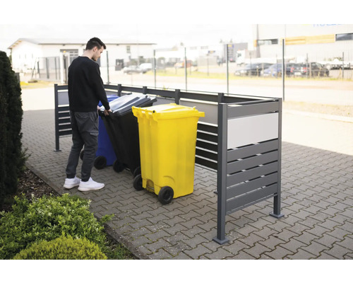 Kryt na smetné nádoby s osobou a smetnými nádobami