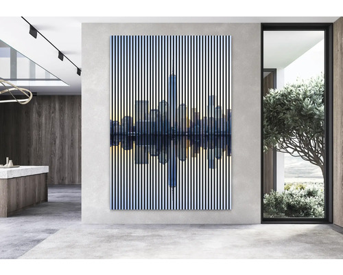 Dekoratívny nástenný obraz s motívom panorámy mesta v moderne zariadenej izbe