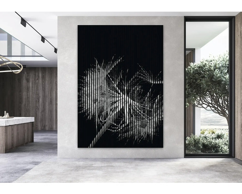 Dekoratívny nástenný obraz s rastlinným motívom v modernom obývacom priestore.