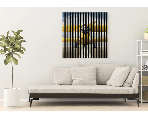 Dekoratívne nástenné umenie s motívom lietadla nad pohovkou