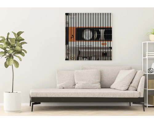 Dekoratívny nástenný obraz s motívom kazety nad pohovkou