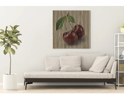 Nástenný obraz s motívom čerešní nad pohovkou v obývacej izbe