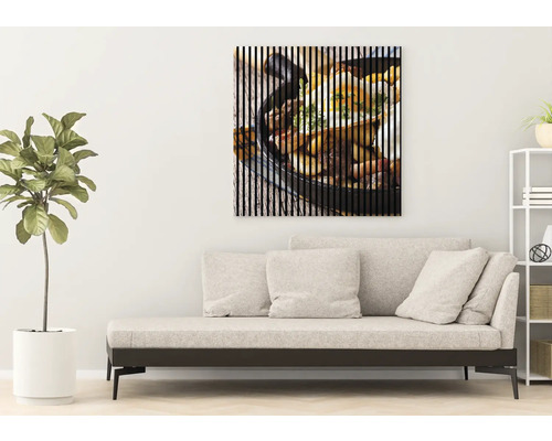 Dekoratívny nástenný obraz s motívom jedla nad pohovkou