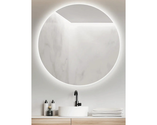 Guľaté zrkadlo s osvetlením nad umývadlom v kúpeľni