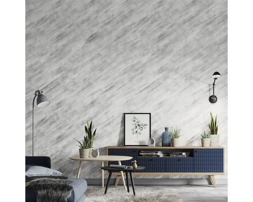 Obývacia izba s pohovkou, stolom, komodou, izbovými rastlinami a nástennými svetlami