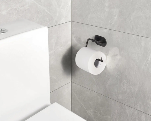 Držiak toaletného papiera s toaletným papierom na stene kúpeľne