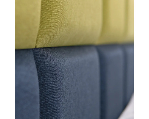 Detail čalúneného čela postele s látkovým poťahom