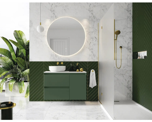 Moderná kúpeľňa so zelenou skrinkou pod umývadlo, okrúhlym zrkadlom a sprchou