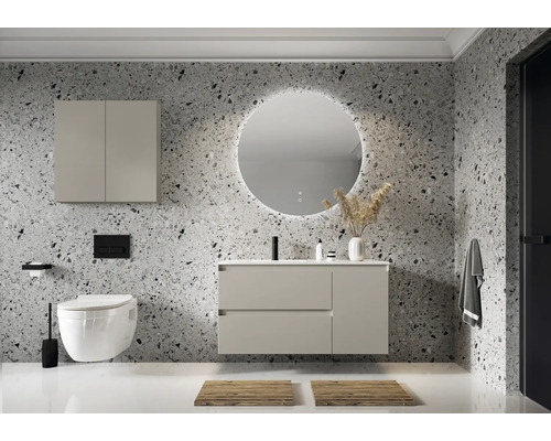 Moderná kúpeľňa s umývadlom, zrkadlovou skrinkou, okrúhlym zrkadlom s osvetlením a závesným WC