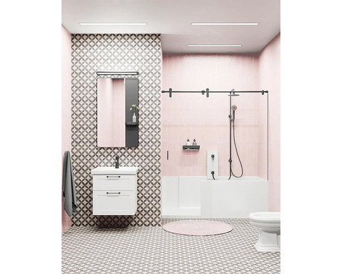 Kúpeľňa s umývadlom, zrkadlom, vaňou a toaletou vo svetlom dizajne