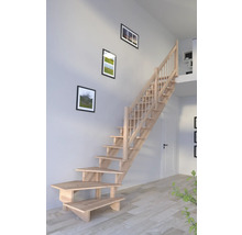 Drevené schodisko v interiéri domu s obrazmi na stene.