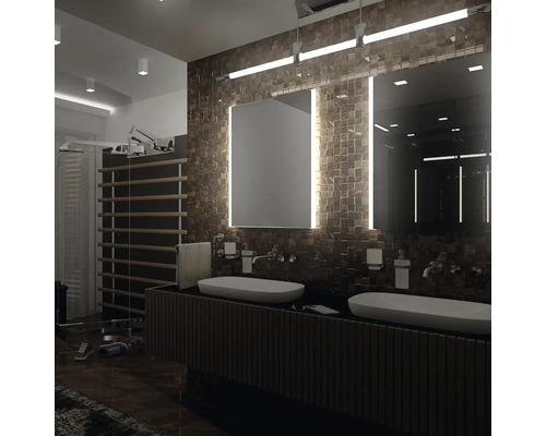 Kúpeľňa s dvojitým umývadlom, osvetlenými zrkadlami a radiátorom