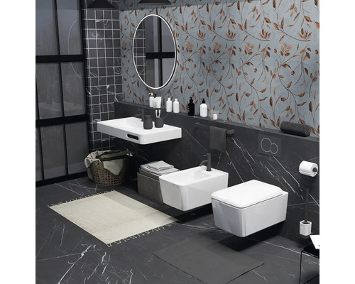 Moderná kúpeľňa s umývadlom, toaletou, bidetom a oválnym zrkadlom