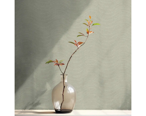 Konár s listami v sklenenej váze