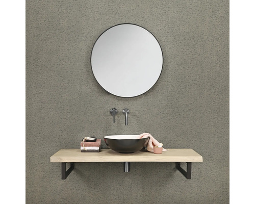 Kúpeľňa s okrúhlym zrkadlom, umývadlovou doskou a umývadlom na dosku