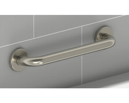 Kovové držadlo do kúpeľne namontované na stene