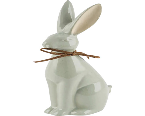 Dekoratívny veľkonočný zajačik so stuhou ako dekorácia stola