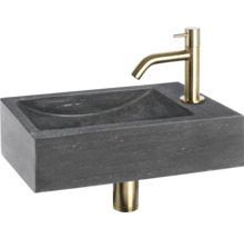 Umývadlo z kameňa so zlatou armatúrou