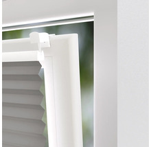 Detailný pohľad na skladanú žalúziu na okne