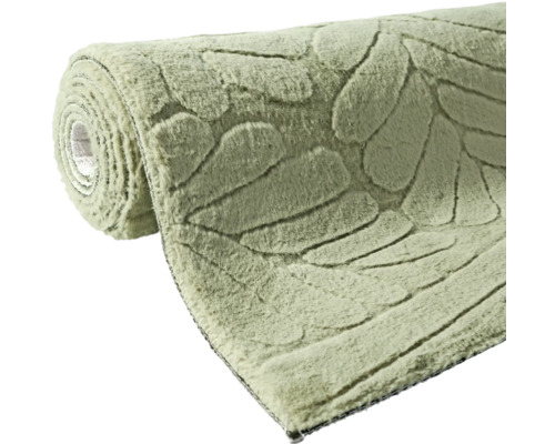Zrolovaný koberec s motívom listov