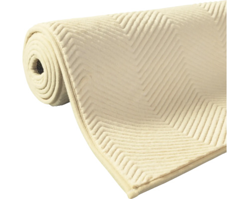 Zroložená podložka pod koberec s cikcakovým vzorom