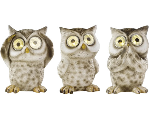 "Tri dekoratívne sovie figúrky so solárnymi svetlami, ktoré znázorňujú gesto ""nevidím, nepočujem, nehovorím""."