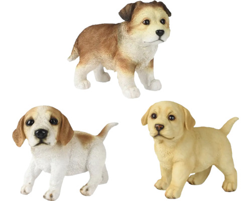 Tri figúrky psov ako záhradná dekorácia