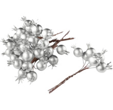 Dekoratívne vetvy so striebornými bobuľami na slávnostné dekorácie