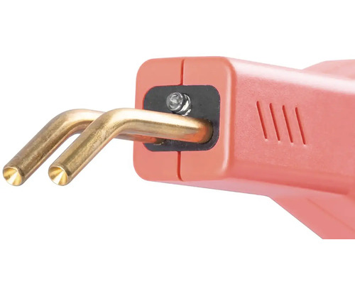 Detailný pohľad na zváracie zariadenie na plasty s dvoma zlatými elektródami.