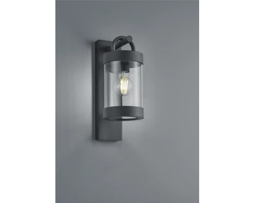 Nástenné svietidlo so skleneným valcom a kovovým držiakom