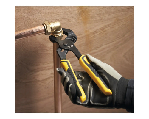 Kliešte na rúry na medenej rúrke s kolenom