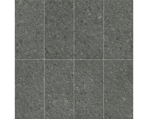 Detail ôsmich sivých podlahových dlaždíc s bodkovanou textúrou