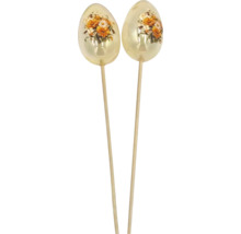 Dve dekoratívne sklenené veľkonočné vajíčka s kvetinovým vzorom na drevených tyčinkách