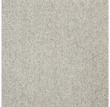 Detail svetlého koberca.