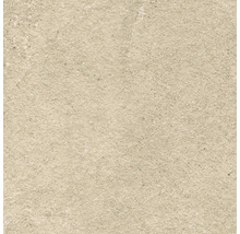 Detail béžovej dlaždice s hrubou štruktúrou.